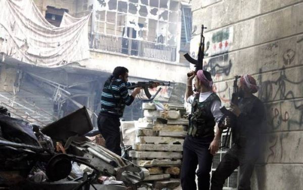 Əsəd ordusu müxaliflərin ələ keçirdiyi şəhərləri bombalayır - 400-dən çox ölən var (FOTOLAR)